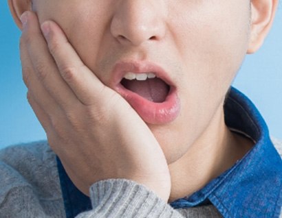 boy with tooth pain